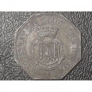 Аверс монеты Германия, 5 пфеннигов, 1917, Цинк, не магнетик. Форма - 8-угольник. На аверсе "MAGISTRAT"