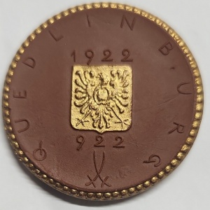 Аверс монеты Германия, 10 марок, 1922, Коричневый цвет. Край и герб с позолотой
