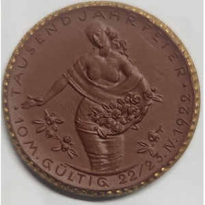 Реверс монеты Германия, 10 марок, 1922, Коричневый цвет. Край и герб с позолотой
