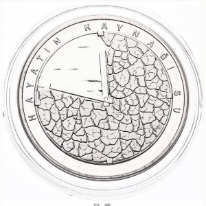 Реверс монеты Турция, 50 лир, 2009, Вода как источник жизни /стрелки часов на полу пустыни/