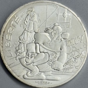 Реверс монеты Франция, 10 евро, 2015, LIBERTÉ, Астерикс и цепи /Астерикс и Банкет/