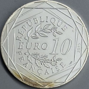 Аверс монеты Франция, 10 евро, 2015, ÉGALITÉ, ножницы /Астерикс и Клеопатра/