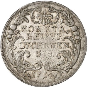 Аверс монеты Город Люцерн, 1 талер, 1714, Слово "SANCTVS" справа