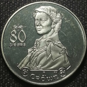 Реверс монеты Остров Мэн, 1 крона, 2006, 80 лет со дня рождения Королевы Елизаветы II /с орденом подвязки/