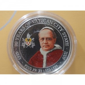 Реверс монеты Палау, 1 доллар, 2009, 80-летие - Город-государство Ватикан. Папа Римский Пий XI