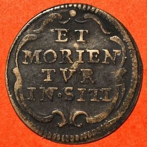 Реверс монеты Папская область, ½ гроссо, 1730, Надпись на реверсе: "ET MORIENTVR IN SITI"