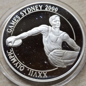 Реверс монеты Замбия, 1000 квач, 1999, XXVII Летние Олимпийские игры, Сидней 2000 - Метание диска