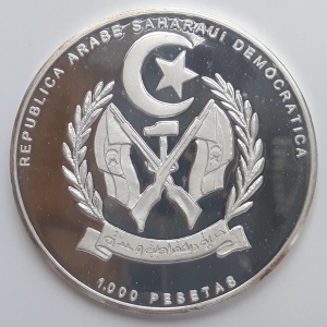 Аверс монеты Западная Сахара, 1000 песет, 1996, Мир приключений - Оруч Рейс и Хайреддин