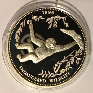 Реверс монеты Лаос, 1000 кипов, 1996, Вымирающие виды - Гиббон