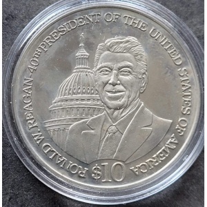 Реверс монеты Либерия, 10 долларов, 2004, 40-й президент США - Рональд Рейган /здание на заднем плане/